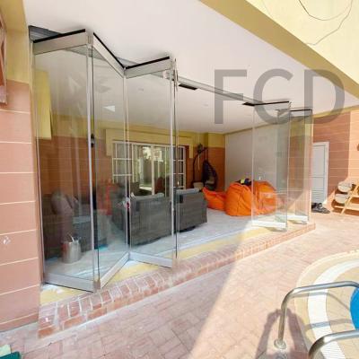 China New Design Aluminum Frameless Glass Folding Sliding Frameless Glass Door OEM/ODM Folding Door Windproof for sale