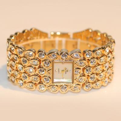 China Water Resistant Bracelet Women Luxury Weding Decoration Watches Full Rhinestone Ladies Wristwatches Gold Diamond Watches relogio feminino 0281 for sale