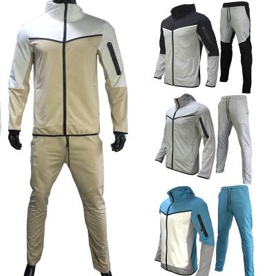 China LCFC Breathable High Quality Bulk Custom Sweatsuits Suits Causal Wholesale Patchwork Jogging Tracksuits For Men for sale