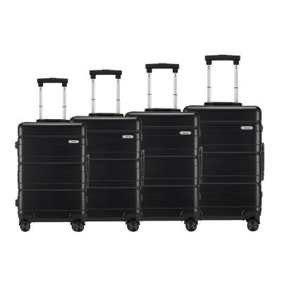 China PC Durable Large Capacity 4 Pcs Luggage Travel Handbag Set Lightweight PC Spinner Rolls Up Suitcase Sets for sale