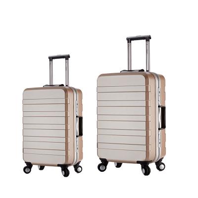 China Waterproof Hard PC Tsa Lock 2pcs Trolley Travel Suitcase Set 4 Wheels Carry On Luggage Sets for sale