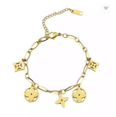 China Miss Ladies Fashion Simple Flower Four Leaf Clover Titanium Steel Bracelet Sense Fashion 18k Gold Bangle Hollow Bracelet for sale