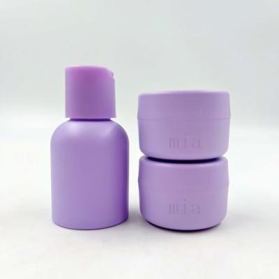 China Luxury High Quality Cosmetic Plastic Purple 60ml Toner Lotion Bottle With Matte Cream Jar Set Skincare Packaging Container for sale