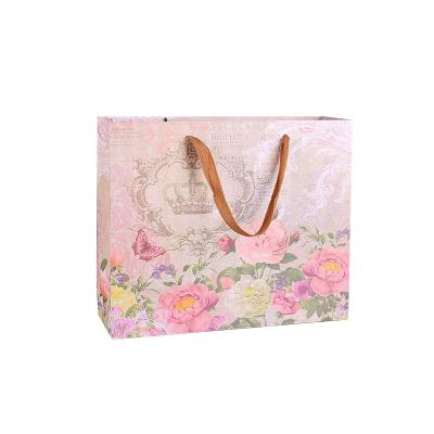 China Recycled materials factory direct sale white paper bag gift bag for gift for sale