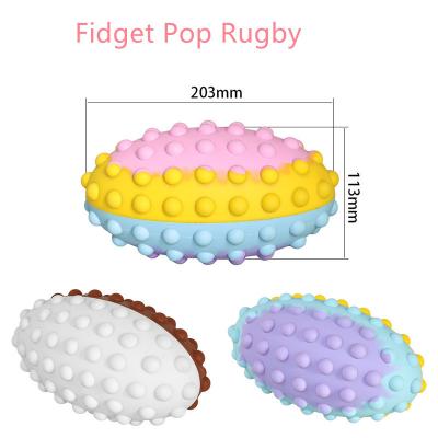 China Toy Amazon Best Selling Unzip Inflatable Rugby Children's Outdoor Sports and Entertainment Football Busy Person Oval Noise Toys for sale