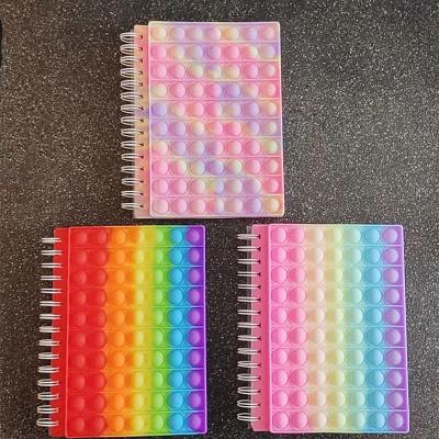 China Wholesale Recycled School Supplies Free Effort Spiral Sillicon Pop Bubble Cover Notebook Custom Daily Planner Journal for sale