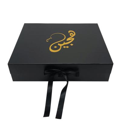 China Recyclable Custom Logo Luxury Paper Packing Black Women Apparel Gift Packaging Box for sale