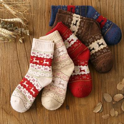 China Breathable Women Men Booties Lady Christmas Gift Winter Woolen Ladies Booties Thermal Thicken Warm Animal Socks for sale