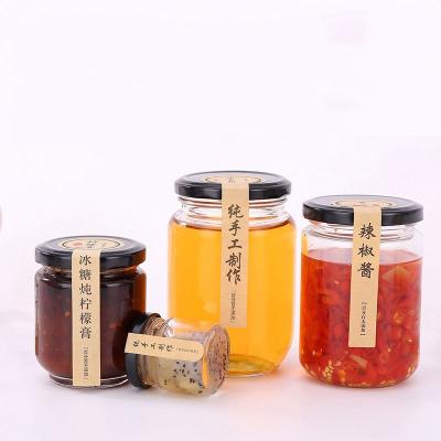 China Clear Glass 200ml 300ml 400ml 500ml 1000ml Round Shape Jam Peanut Butter Glass Jars With Lid for sale