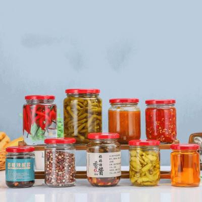 China Freshness Preservation 500ml 750ml 1000ml Metal Top Bottle Around Storage Honey Jam Pickles Glass Jar With Metal Lid for sale