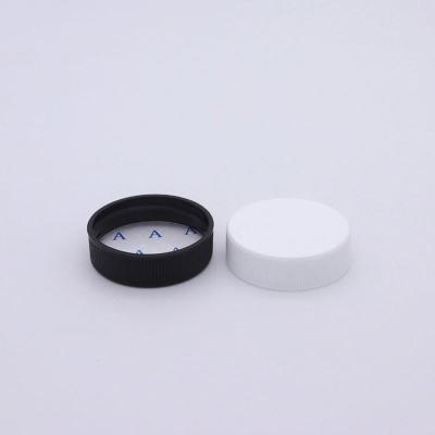 China Non Spill 38mm PP Matte Top Screw Cap Plastic Capsule Closure With Sealing Liner for sale