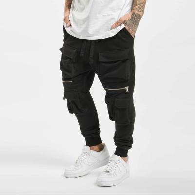 China Anti-Wrinkle Black 100% Polyester Fleece Cargo Pants Men's Casual Fit Drawstring Sweatpants With Multiple Pockets for sale