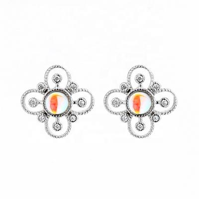 China Best Selling Trendy Rhodium Plated Hollow Flower Shaped Clover Stud Earrings With Moonstone for sale