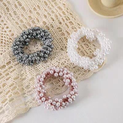 China Wholesale Korean Hip Hop Pearl Hair Bands For Women Elastic Hair Bands Girls for sale