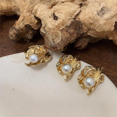 China Vintage Metal Cute Geometric Irregular Leaf Inlaid Pearl Ring Personality Color Preserving Earring for sale