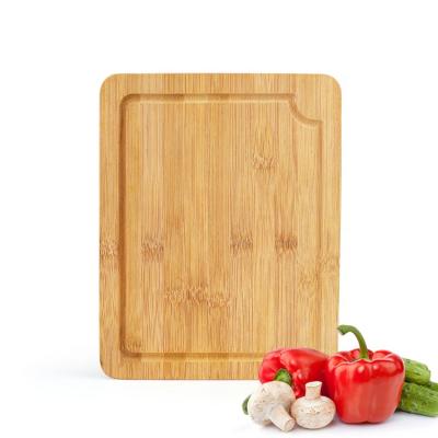 China Viable Kitchen Chopper with Juice Groove, Tray Organic Bamboo Cutting Block serving for sale