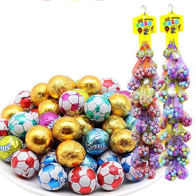 China Yummeet Chocolate Crispy Candy Suppliers Chocolate Snack Football Shape Colored Chocolate Candy for sale