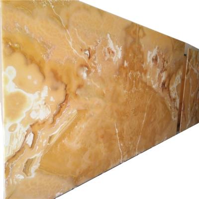 China Coloprhony Onyx Marble Slabs Rosin Onyx Floor Tiles Modern Polished Surface for sale