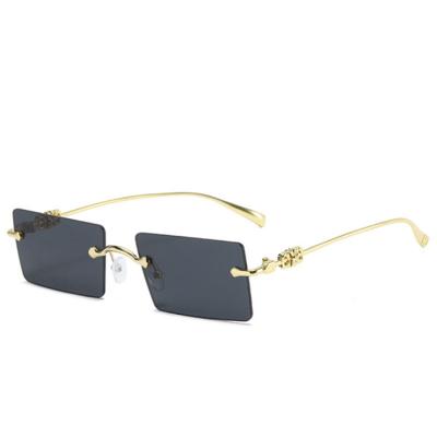 China Fashion Rimless Metal Rimless Shaded Sunglasses for sale