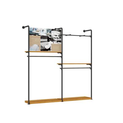 China Environmentally Friendly Iron men's clothing racks light luxury wall floor-to-ceiling lock wall clothing store display racks for sale