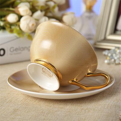 China Viable Cappuccino Simple Handcrafted Bone China Cup Bone China Pink Coffee Cup With Saucer Set With Gold Handle for sale