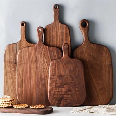 China Kitchen Cutting Board Beech Wood Black Walnut Pizza Stored Bread Fruit Can Hang Cut Non-Slip Kitchen Tool Accessories for sale