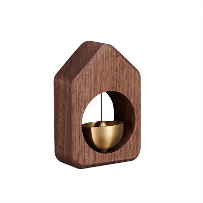 China Household Small Hanging Door Ornament Bell Wind Chimes Modern Wooden Solid Wood Absorbing Wooden Doorbell for sale