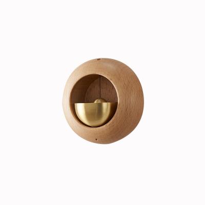 China Wooden Wooden Door Mini Brass Acoustic Wind Chime For Home Decor for sale