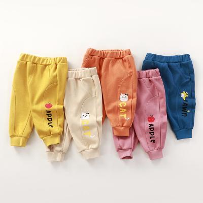 China Fashion trend anti-pilling children's piled pants spring autumn with cartoon patchwork children's pants piled sweatpants for sale