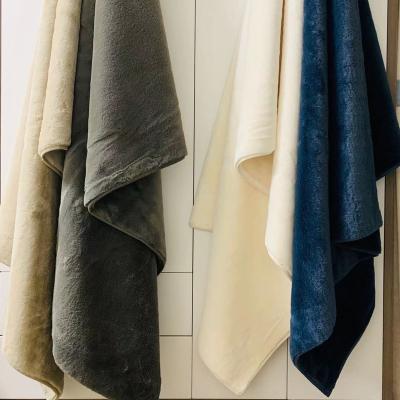 China New Luxury Solid Warm Material For Winter Rabbit Faux Fur Throw Blanket High Quality for sale