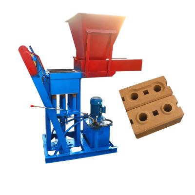 China Building Material Shops Small Manual Earth Hydraulic Mud Clay Interlocking Cemen Block Interlocking Brick Making Machine For Sale for sale