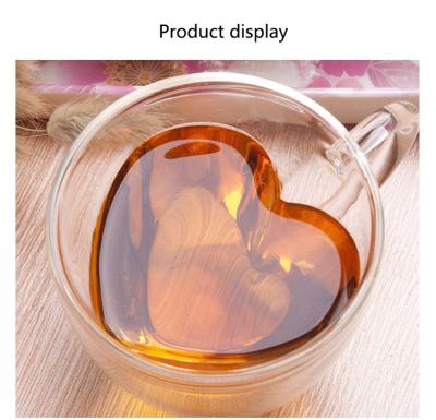 China Durable Double Wall Tea Resistant Beer Glasses Magnet Coffee Mug Transparent Double Wall Heart Glass Mug for sale