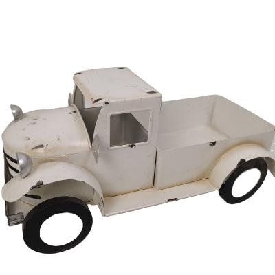 China CLASSIC Flower Pot Truck White Flower Pot Metal Truck Planter for sale