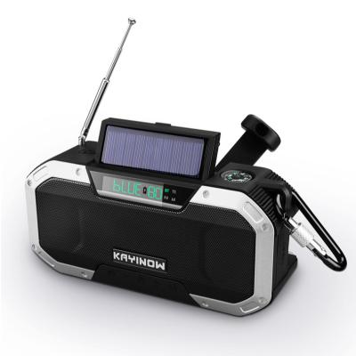 China Digital Display Digital FM Radio KAYINOW Backup Time Solar Crank Radio with 5000mAh Input Power Bank 3W Flashlight Audio Reading Light and SOS Alarm for sale