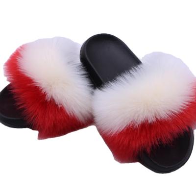 China Imitation Fur Slippers Fashion Trend Hot Selling Color Unique Matching Color Fox Fur Rubber Slippers for sale