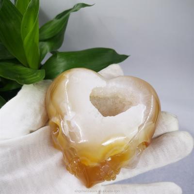 China Europe Hot Selling Natural Crystal Heart-Shape With Geode Engraved Agate Crystal Skulls Buy For Sale for sale