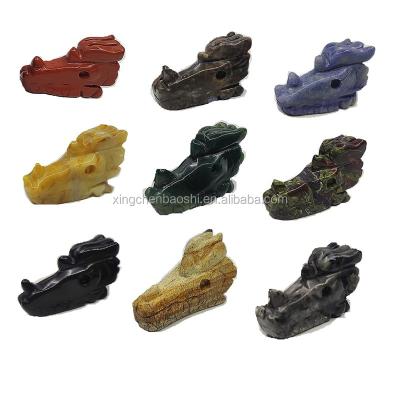 China China Wholesale 2 Inch Hand Carved Various Materials Of Small Dragon Head Bone Crystal Skulls For Sale for sale