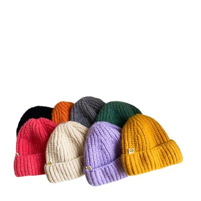 China COMMON Trawler Beanie Watch Hat Roll Up Beanie Fisherman Beanie For Girls Boys Smiling Sailor Label Face Short Beanie for sale