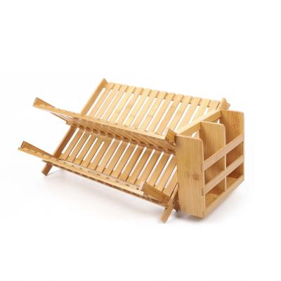 China Countertop Sustainable Bamboo Kitchen Foldable Dish Drying Rack Compact Wooden Rack Dish Drainer With Utensil Basket for sale