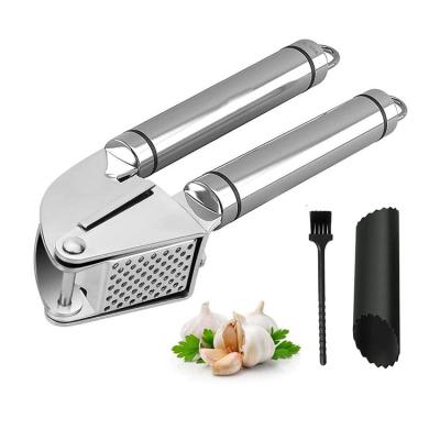 China Easily chop two unpeeled garlic cloves and peeled root ginger garlic press and peeler set. Stainless steel meat grinder and silicone tube roller for sale