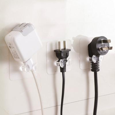 China Transparent Type Viable Plastic Home Bathroom Rack Hanger Wall Hook Power Outlet Socket Holder Non-trace Adhesive Hooks for sale