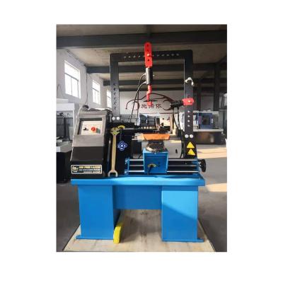 China Economic factory custom design ectro hydraulic hub wheel repair machine rim straightening for sale