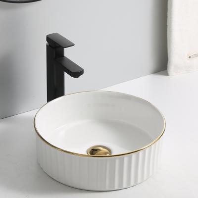 China Artisan Electroplated Handmade Ceramic Round Luxury Modern Bathroom Sink Art Basin for Hotel in Gold with CUPC CE Certificate for sale