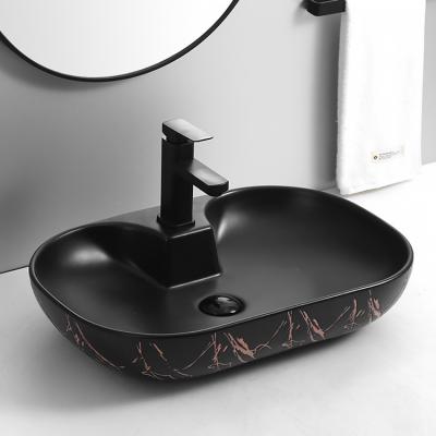 China Traditional Ceramic Countertop Hand Lavatory Bathroom Sink CUPC CE Black Marble Art Basin for sale