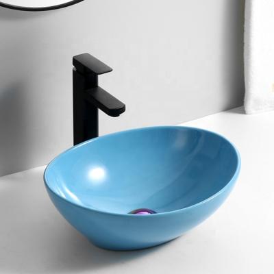 China 9020 Factory direct G-015 high end hand wash basin modern oval porcelain bathroom sinks in blue for sale