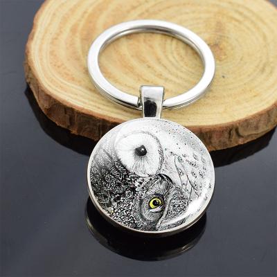 China Minerva Gift Promotion Owl Keychain Dome Key Ring Bird Pendant Nighthawk Jewelry Double Sided Glass Bird for sale