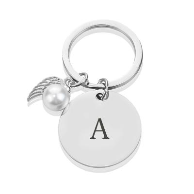 China Trendy Initials Trend Key Ring Men Women Simple Metal Stainless Steel Key Chain Car Bedroom Alphabet Key Accessories Couples Gift for sale