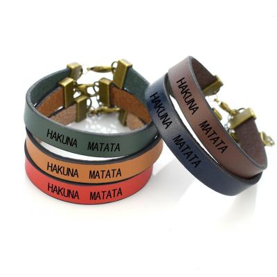 China Vintage Simple Design Vintage Leather Bracelet Engraved Words Hakuna Matata Inspired Dream Bracelets For Kids Son Girls Gifts for sale