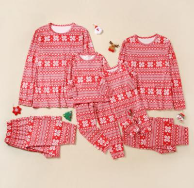 China 2021 Hot Red Snowflake Christmas Full Print Hot Sale Family QUICK DRY Matching Pajamas Lovely Sets Christmas Pajamas for sale