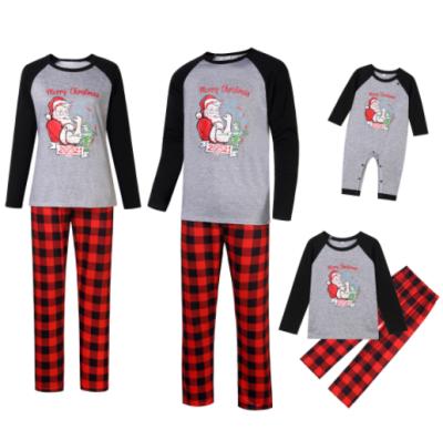 China 2021 QUICK DRY NEW Wholesale Drop Shipping Super Funny Santa Printed Family Christmas Matching Pajamas Sets Christmas Apparel for sale